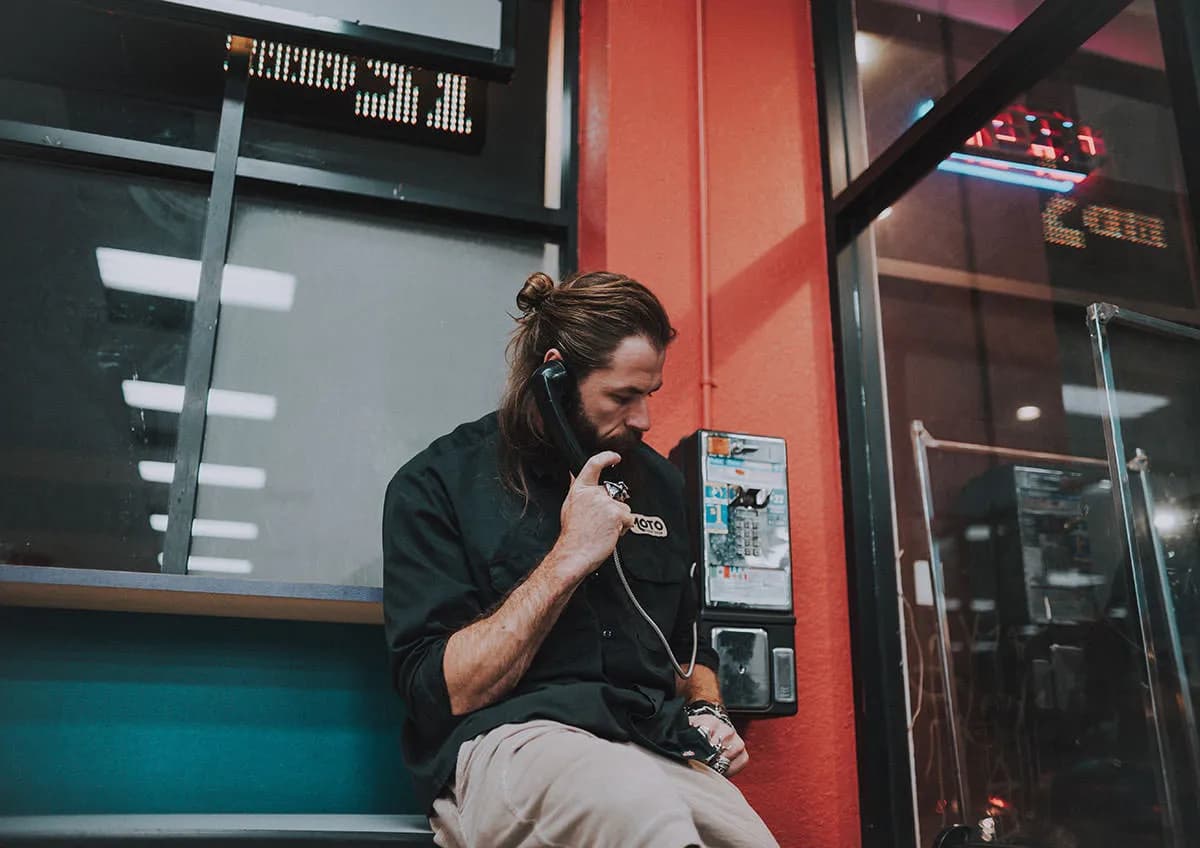 Christopher Bailey on a payphone