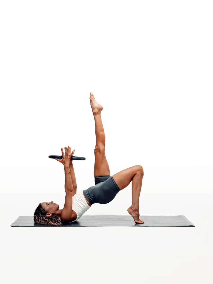 Pilates bridge with ring and leg extension photographed by Christopher Bailey