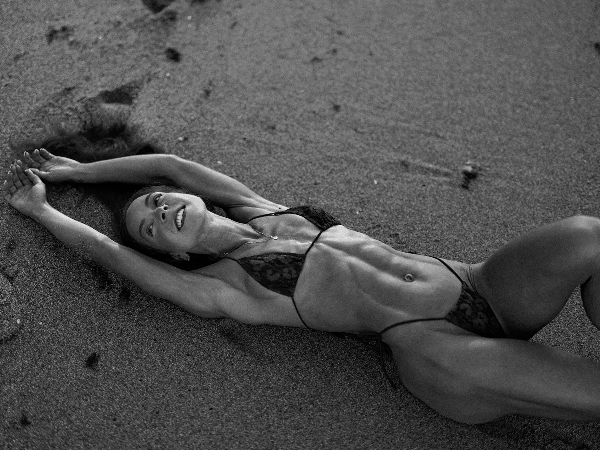 Sara Basha Marbella beach shoot, low sunrise light along the shoreline