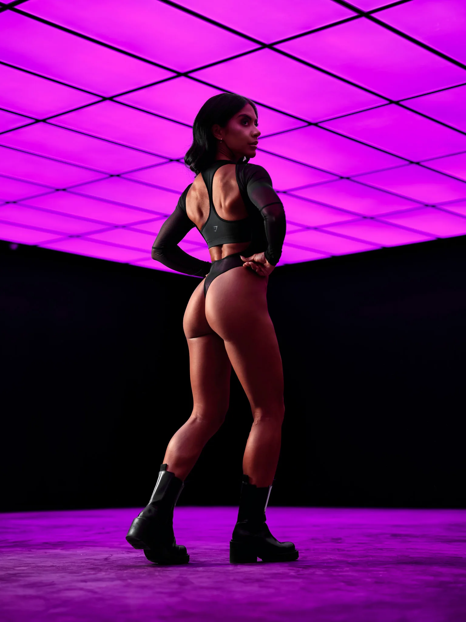 Jasmine Dawn under the magenta RGB ceiling at The Neon, Nottingham's drive-in content studio