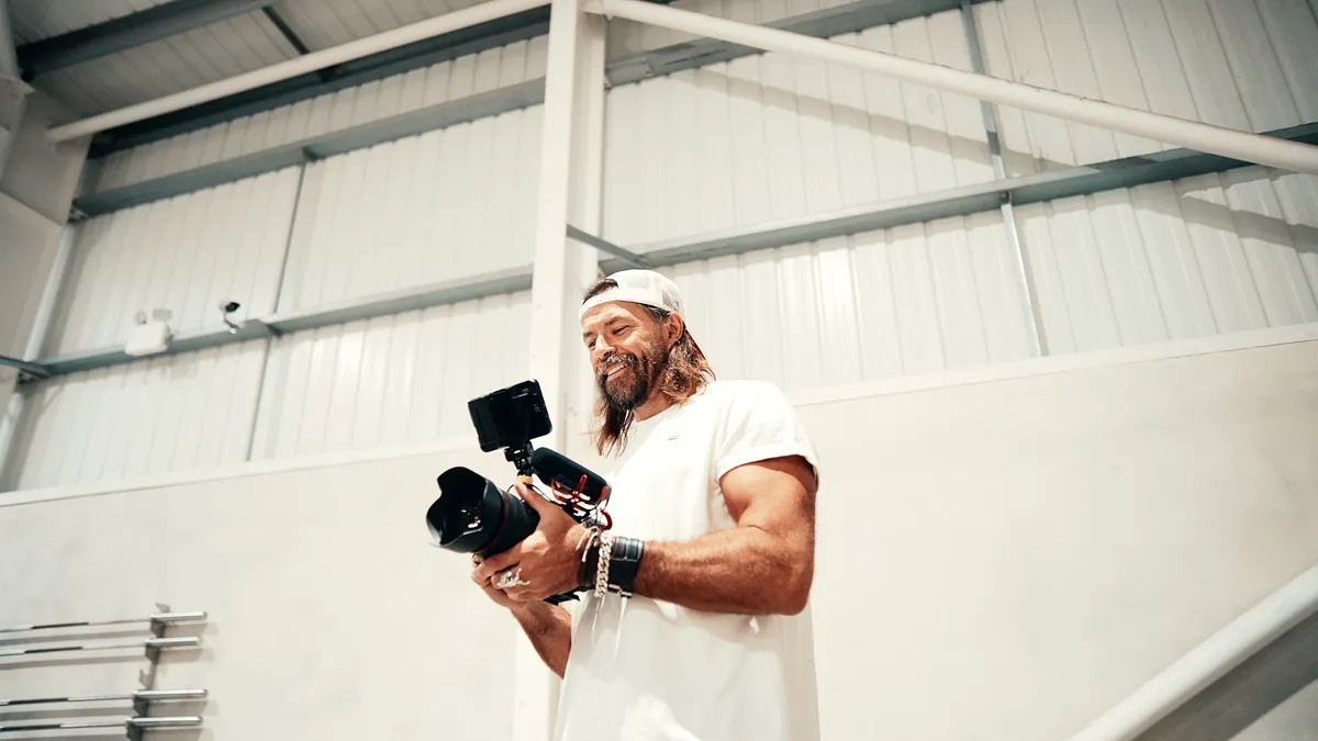 Christopher Bailey with video rig in a modern gym studio